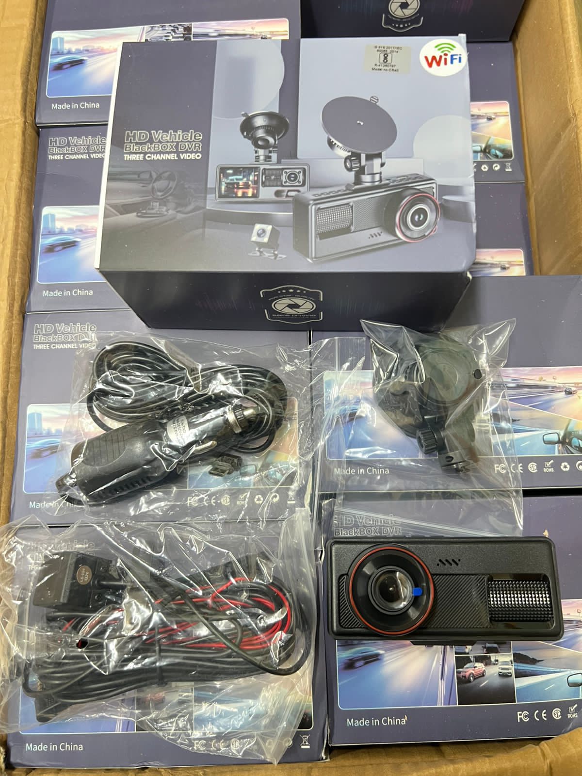 HD Vehicle BlackBOX DVR three-channel WiFi dash camera kit with suction mount and car charger adapter in retail packaging