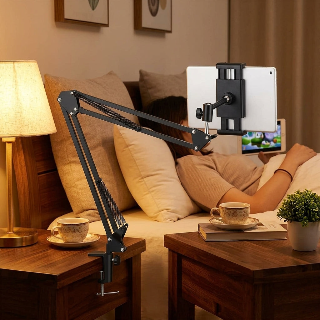 Black adjustable scissor-arm desk clamp phone and tablet holder stand with spring-assisted joints and device cradle